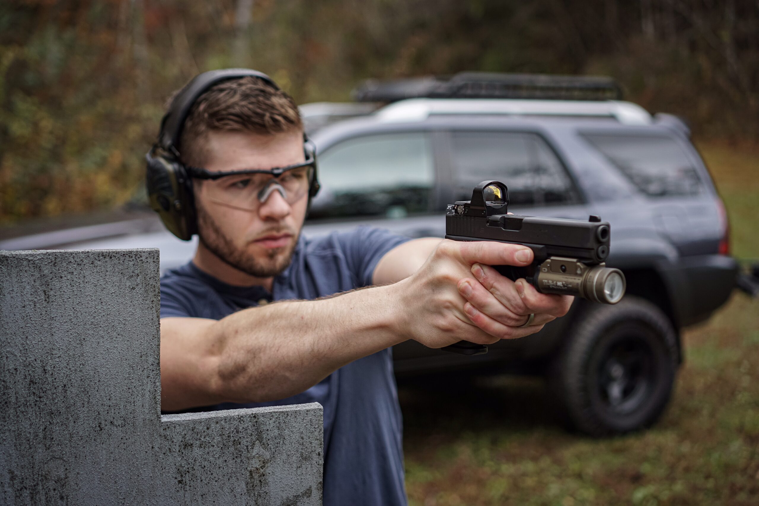 The author shooting a Gen 4 Glock 17 at a shooting range