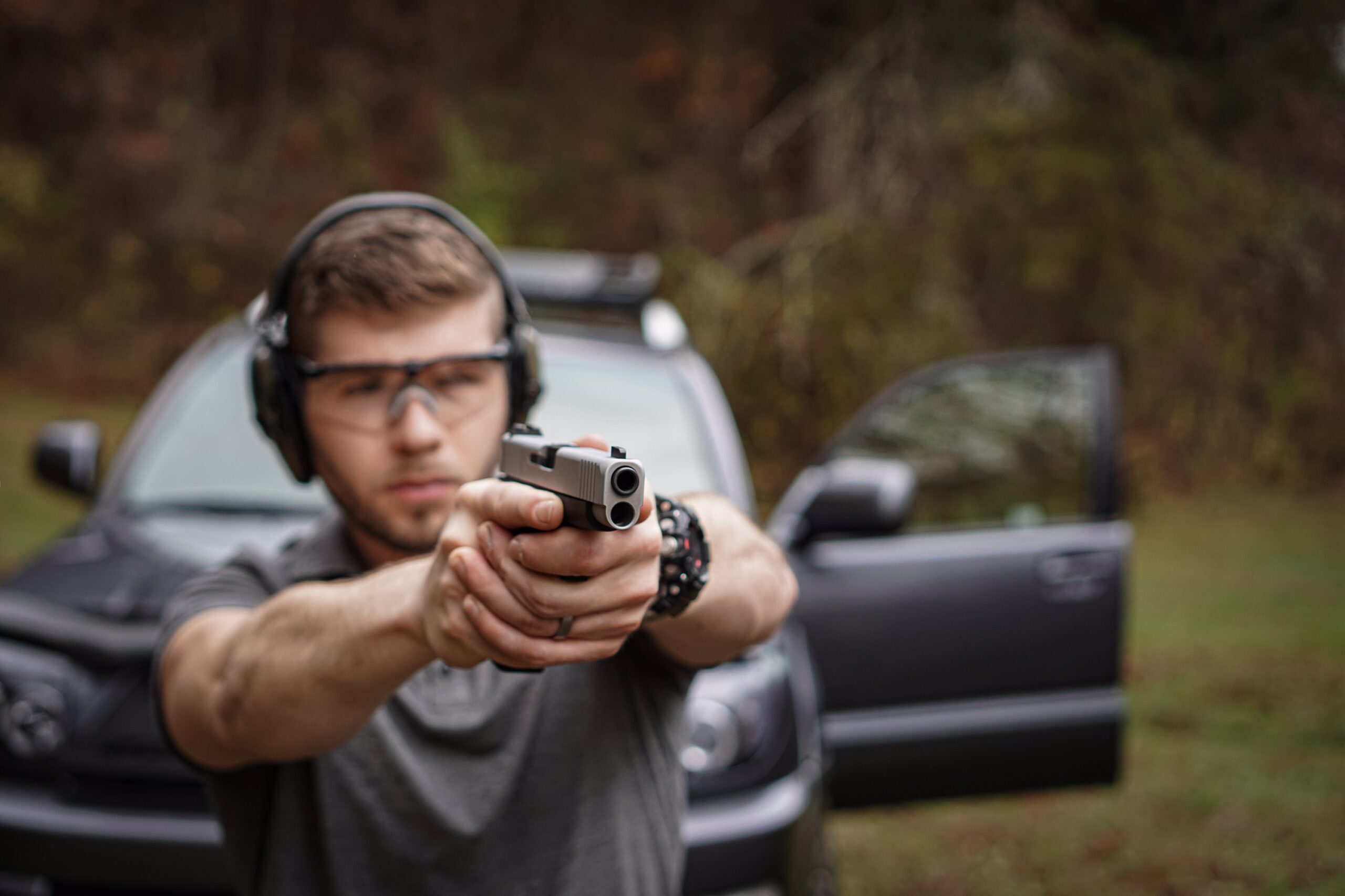 Nolan, the author Firing a Glock 48 at the shooting range