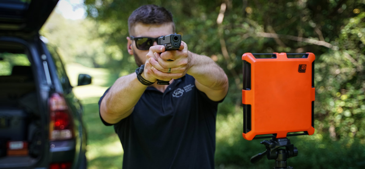 Shooting 10mm at a shooting range to test muzzle velocity