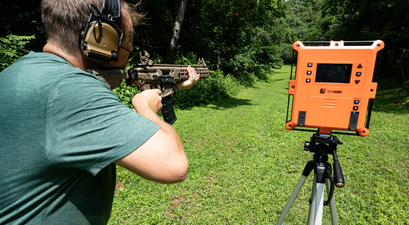 Shooting a 300 Blackout rifle with a chronograph at a shooting range